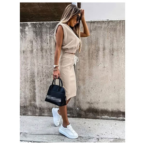 Conjunto de dos piezas para mujer 2026 al por mayor, sexy, casual, de verano, liso, con aberturas, sin mangas, con cordón, falda y top corto - Product Image 6