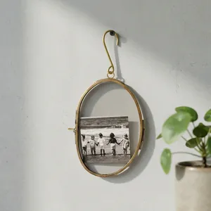 Oval <b>Metal</b> <b>Photo</b> <b>Frame</b> with Hook for Wall Hanging Vertical Display Brass glass picture <b>frame</b> brass finish - Product Image 2