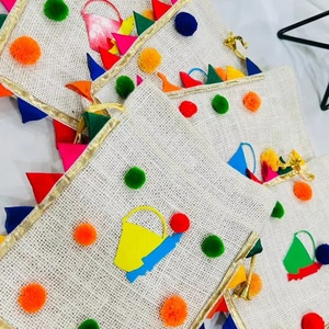 กระเป๋าโฮลีสีสันสดใสสำหรับงานเฉลิมฉลองสีสัน งานฝีมืออินเดียแบบดั้งเดิม ทำจากผ้าปอกระเจา กระเป๋าโฮลีงานฝีมือสำหรับงานเทศกาล - Product Image 1