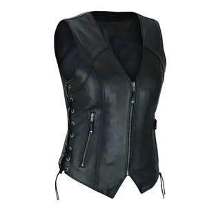 เสื้อกั๊กมอเตอร์ไซค์หนังสีดำแบบคอวีสำหรับผู้หญิง ยี่ห้อ Kadia Custom พร้อมเชือกผูกด้านข้าง ซิป และโลโก้ปั๊มนูน สำหรับขี่มอเตอร์ไซค์แบบ Tactical - Product Image 1