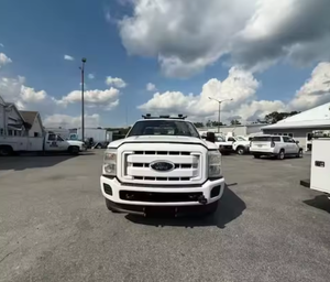 Camioneta Ford F-350 de cabina extendida 4x4 usada, limpia, modelo 2011, con enganche de remolque, ideal para mecánico, servicio, utilidades, construcción y trabajos manuales. - Product Image 1