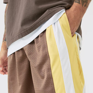 กางเกงบาสเก็ตบอลคุณภาพสูงแบบขายส่ง ผ้าโพลีเอสเตอร์พิมพ์ลายแบบซับลิเมชั่น กางเกงบาสเก็ตบอลตาข่ายแบบกลับด้านได้ - Product Image 5