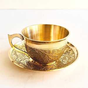 Brass <b>Cup</b> and <b>Saucer</b> Set with Opulent Shine and Graceful Silhouette for Weddings, Celebrations, and Family Gatherings - Product Image 1