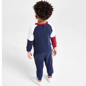 Survêtement de performance Junior Circuit pour enfants |   Veste d'entraînement orange vif à fermeture éclair intégrale avec pantalon de jogging à rayures latérales contrastées bleu marine - Product Image 6