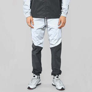 Pantalones Cortavientos Impermeables Personalizados para Hombre con Bloques de Color, Pantalones Deportivos con Paneles Reflectantes, Joggers, Ropa Deportiva Urbana, Pantalones para Deportes al Aire Libre - Product Image 1