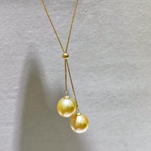 Collier en or 18 carats réglable en forme de Y avec perle d'eau douce Akoya de 3-4 mm et perle d'or champagne de 10-11 mm - Product Image 1