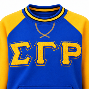 เสื้อสเวตเชิ้ตคอกลมสีน้ำเงินรอยัล ตราสัญลักษณ์ Sigma Gamma Rho  ตกแต่งด้วยผ้าเชนิลล์  แขนเสื้อแบบแร็กแลนสีทอง กระเป๋าแบบจิงโจ้ และขอบยางยืดลายทาง - Product Image 5