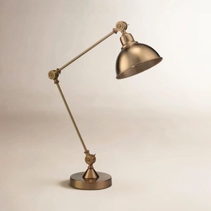 Lampe de table contemporaine en laiton avec globe en verre givré, éclairage moderne pour bureau et console - Product Image 1