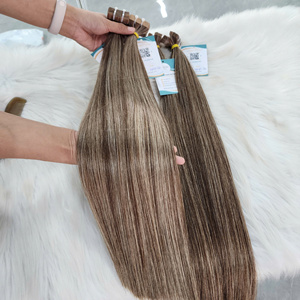 Extensiones de cabello con cinta adhesiva, color rubio con reflejos, cabello vietnamita virgen de alta calidad, para venta al por mayor. - Product Image 1