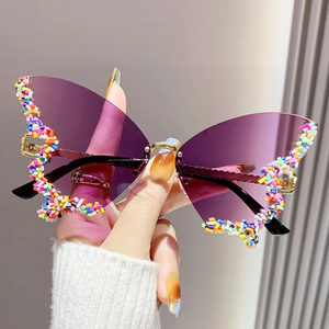 Lunettes de soleil papillon de luxe uniques en gros pour femmes et hommes, sans monture, en métal, couleur bonbon, populaires, tendance, style punk - Product Image 3