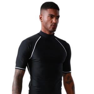 Men's Black Short Sleeve Rash Guard Compression Shirt Quick Dry Spandex Polyester Top for <b>Surfing</b> and Water Sports - Product Image 3