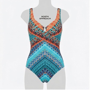 Ensemble de yoga 2 pièces imprimé papillon bleu avec finition dorée, body à col en V profond et jupe portefeuille longueur genou - Product Image 1