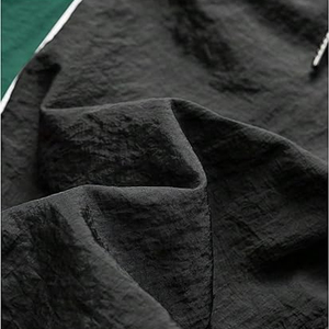 กางเกงวอร์มไนลอนทรงหลวมคุณภาพสูงสำหรับผู้ชาย กางเกงกันลมกันยับ เอวยางยืด มีเชือกผูก เหมาะสำหรับกีฬากลางแจ้ง - Product Image 3