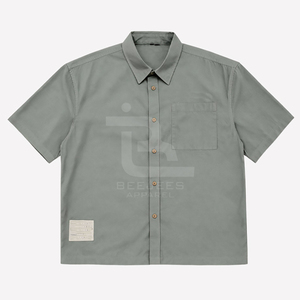 เสื้อเชิ้ตผู้ชายสีดำลำลอง ระบายอากาศได้ดี เป็นมิตรกับสิ่งแวดล้อม แห้งเร็ว ทรงหลวม ผ้าป๊อปลินทอเนื้อผ้าผสมโพลีเอสเตอร์และคอตตอน ไซส์ใหญ่ สำหรับฤดูร้อน - Product Image 1