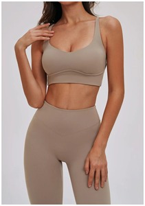 Ensemble de yoga 2 pièces pour femmes, vente en gros personnalisée, extensible dans quatre directions, soutien-gorge de sport sans couture et leggings élastiques taille haute - Product Image 2