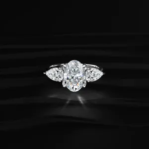 Oval Cut Diamond Trilogy <b>Ring</b> With Pear Cut Side Stone With IGI Certified VVS-VS Clarity Buy Direct From <b>Indian</b> Trusted Supplier - Product Image 1