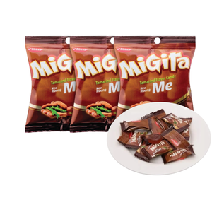 ลูกอมรสส้มแขกมิกิต้า รสเปรี้ยวหวาน รูปทรงแท็บเล็ตสีน้ำตาล บรรจุในถุง - Product Image 1