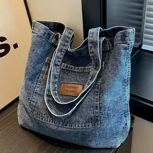 Sacs fourre-tout robustes en jean bleu pour usage commercial, sacs à bandoulière multi-poches en tissu de coton pour femmes, idéaux pour les voyages et l'école, vente en gros - Product Image 1