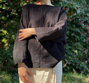 เสื้อครอปท็อปผ้าฝ้ายเนื้อนุ่มสำหรับผู้หญิง ทรงหลวม แขนสามส่วน คอวี สไตล์ลำลอง เหมาะสำหรับฤดูร้อน สไตล์โบฮีเมียน สำหรับใส่ทำงาน ผลิตแบบ ODM - Product Image 1