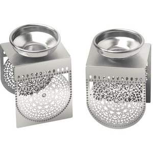 Portavelas de metal con recortes intrincados que aportan un toque de sofisticación a estilos de decoración modernos y tradicionales. - Product Image 3