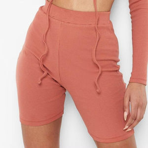 Conjunto de dos piezas para mujer al por mayor: top corto y pantalones jogger de cintura alta, ajuste ceñido, casual, de verano, color liso, ecológico. - Product Image 1