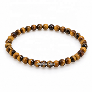 สร้อยข้อมือพลอยไทเกอร์อาย AA ขนาด 4 มม. ขายส่ง – สร้อยข้อมือยืดหยุ่นประดับลูกปัดไทเกอร์อายสีน้ำตาลทองธรรมชาติ - Product Image 1