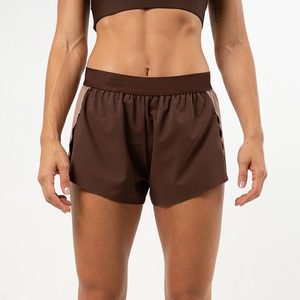 Shorts de yoga taille haute asymétriques en maille, résistants aux plis, bleu uni, sans coutures, extensibles dans quatre directions, pour fitness et entraînement en salle de sport - Product Image 3