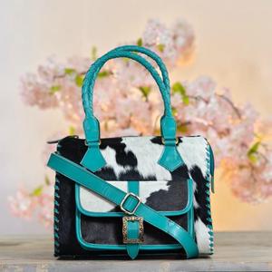 Bolso de lujo de cuero vacuno premium con asa trenzada y correa cruzada de cuero. - Product Image 1