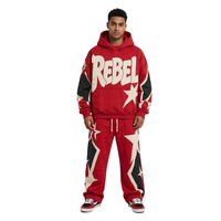 Setelan Olahraga Berkualitas Tinggi dengan Bahan Fleece Cokelat, Kerah Hoodie, Lengan Jatuh, Lubang Logam, Ujung Celana Jogger, dan Cetakan Puff untuk Cuaca Dingin