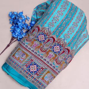 Tela Crepé Ligera de 54 Pulgadas con Patrón Paisley, Color Turquesa Sublime, Adornada con Lentejuelas Deslumbrantes, Diseño de Elefante y Pavo Real - Product Image 4