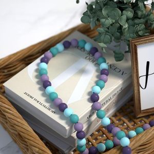 Guirlande de perles en bois colorées avec pompon pour la décoration de la maison - Product Image 3