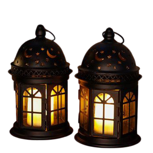 Farol de metal moderno y artesanal para decoración contemporánea que agrega estructura artística y un efecto de luz cálida. - Product Image 1