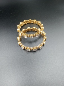 AMAIRA JEWELS Bracelet de fiançailles tendance pour femme en argent plaqué or avec cristaux Polki et strass sertis clos, Bijou à la mode - Product Image 1