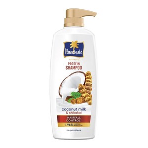 Champú proteico con leche de coco y fórmula enriquecida con shikakai diseñado para reducir la caída del cabello, suavidad, sin parabenos, 650 ml. - Product Image 1