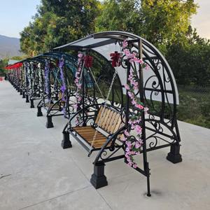 Silla Columpio Decorativa Contemporánea de Hierro Forjado con Toldo para Jardín, Patio, Escuela y Parque, Muebles de Asiento Relajantes para Exteriores - Product Image 1