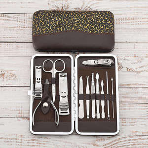 Outils de manucure Coupe-ongles et lime à ongles multifonctionnels Kit de soin des ongles en acier inoxydable 12 pièces - Product Image 1
