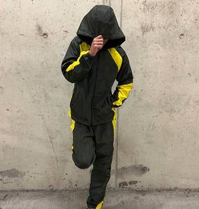 Fabricación de Conjuntos de Chaquetas Cortavientos y Pantalones Deportivos de Nailon de Alta Calidad, Traje Deportivo Cortavientos Holgado y Resistente al Viento para Hombre - Product Image 5