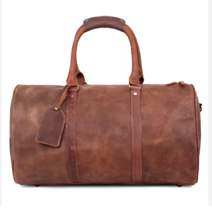 Sac de voyage en cuir véritable, fabriqué avec des matériaux de qualité supérieure, offre durabilité et un toucher luxueux, intérieur spacieux. - Product Image 1
