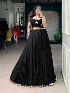 Elegancia de diseñador en una tela ligera con bordado de loto y una elegante chaqueta larga lista para usar como lehenga para Navratri. - Product Image 1