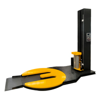 Machine d'emballage de palettes à film étirable de type E entièrement automatique pour entrepôt, avec plateau tournant, pour film LDPE à motif M et film d'emballage en rouleau pour cartons, et utilisée