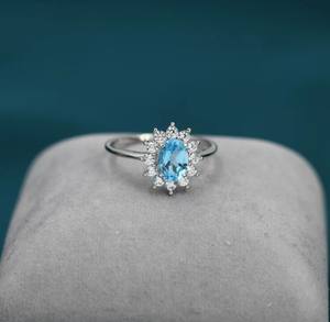 แหวนเงินแท้ประดับบลูโทแพซแท้จากสวิสและเพชร CZ ทรงฮาโล แหวนโทแพซธรรมชาติ แหวนซ้อนกันได้ - Product Image 4