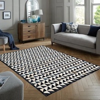 Tapis moderne fait main en patchwork de cuir de vachette noir et blanc, tapis en cuir véritable pour usage résidentiel et commercial