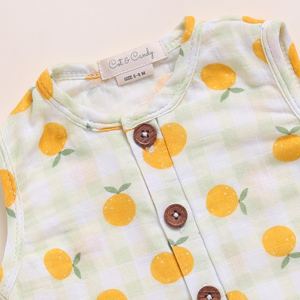 Media mameluco de muselina orgánica de calidad superior con estampado naranja para la comodidad y el estilo del bebé - Product Image 3