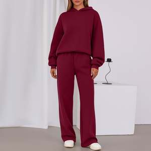 Vente d'usine : Ensemble de survêtement 2 pièces pour femme, comprenant un sweat à capuche oversize et un pantalon large, idéal pour la détente et le sport. - Product Image 1