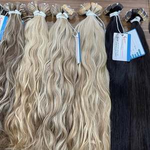Extensions de cheveux naturelles ondulées à bandes adhésives, très tendance, diverses couleurs, prêtes à être expédiées, 100% cheveux humains vietnamiens de haute qualité - Product Image 1