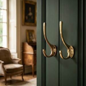Modern brass wall coat <b>hook</b> designed for practical storage convenience while enhancing sophisticated household interiors - Product Image 4