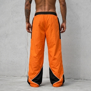 Pantalon de survêtement coupe-vent pour homme, bas de tenue haute performance conçu avec un matériau léger et à séchage rapide pour l'exercice et la course à pied - Product Image 2
