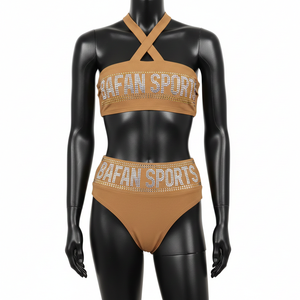 ชุดบิกินี่ไนลอนสแปนเด็กซ์ GSM คุณภาพสูง สีน้ำตาลอ่อน เนื้อผ้ายืดหยุ่นเรียบ ประดับด้วยคริสตัล  รับสกรีนโลโก้ตามแบบ ชุดบิกินี่สำหรับผู้หญิง - Product Image 1