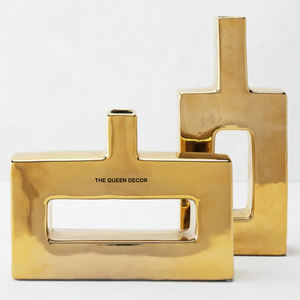 Diseño admirable, el más demandado, florero metálico redondo de aluminio con acabado en polvo blanco y diseño de flor dorada. - Product Image 2