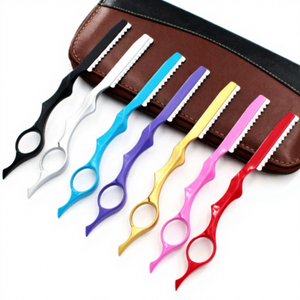 Tijeras de Entresacar IKZARSA Azules con Hoja de Acero al Carbono, 29 Dientes, Diseño de Mango Largo para Diestros, para Barberos y Uso en Salones - Product Image 5
